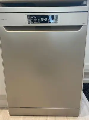 a white oven with a clock on top of it at Surf's Up! Perfect base for holidays or work in Cornwall in Saint Columb Major