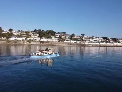 a boat on a large body of water at Upper Tresulian in Saint Mawes