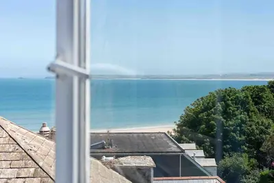 a view of the ocean from a window at Little Haven St Ives - with parking in St Ives