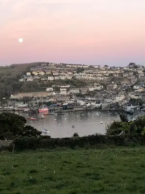 a view of a city with boats in the water at Home from Home self catering for 2 in St Austell