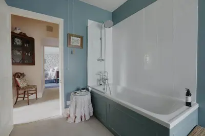 a bathroom with a large tub in a room at Trewardale in Bodmin